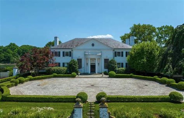 How much playboy mansion sold for?