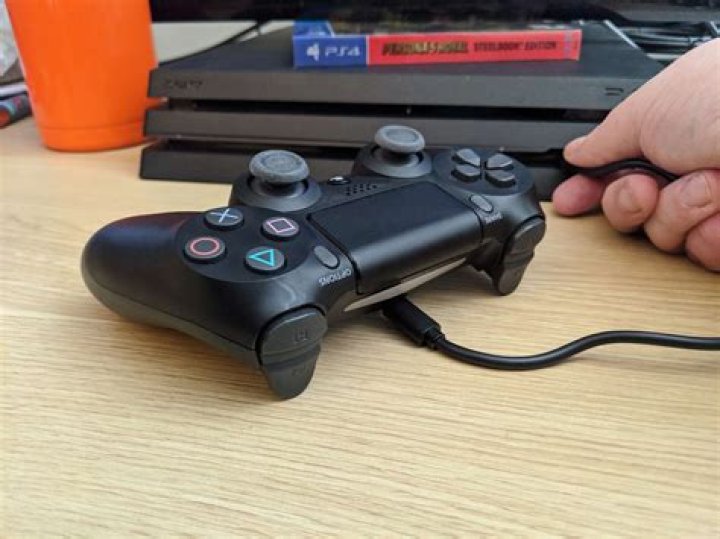 PS4 controller won't connect after connecting to PC [duplicate]