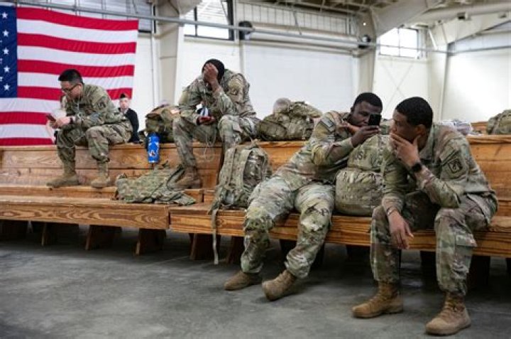 What determines when base troops are discarded?
