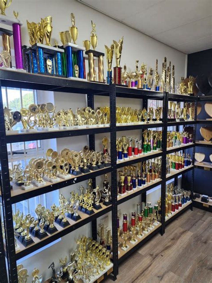 Which trophies can only be obtained through the Trophy Shop?