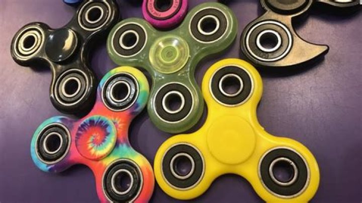Who invented fidget spinners?