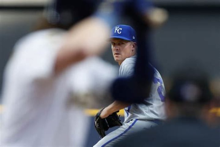 Why did zack greinke leave the royals?